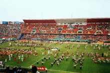 Photograph of an artistic show inside a football stadium