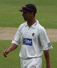 Alfonso Thomas on a cricket field.