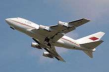 Ventral view of quadjet climbing in the sky.