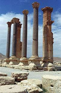 Four columns at the entrance of a building