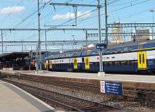 An S12 train arrives at Brugg.