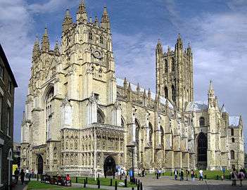 stone cathedral oblique view showing two west towers and central tower