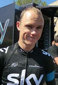 A man wearing a black jersey.