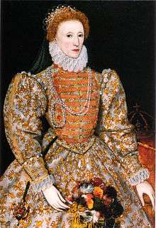  Woman, facing left, with a tiara on red-coloured hair, wearing voluminous and heavily decorated clothing with large sleeves, tight waist and a ruff round the neck. A crown on a table is visible in the background