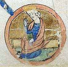  A circular medieval miniature, showing a man in blue robes, with long flowing hair and a short beard.