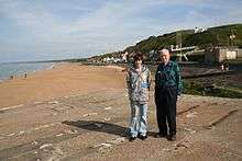 John Eicher with his grandson Chris Eicher, on Omaha Beach, Normandy, France, 2008.