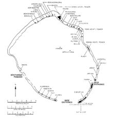 Map of Enewetak Atoll. The coral reef gives the atoll a circular shape. Most of the islands are at the northern end, including the three used as test sits. The main island of Enewetak is in the south.