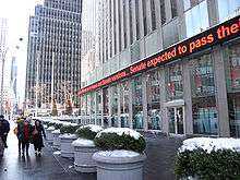 Large New York building with plantings in front