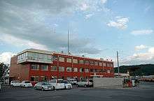 Photo of the red exterior of Fukushima Transportation's headquarters