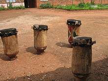 four drums in courtyard