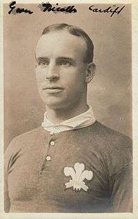 Portrait of Nicholls wearing his Wales top, which includes the Prince of Wales feathers on the left breast