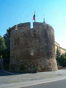 A rounded tower of a fortress