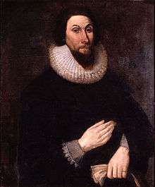 The bearded Winthrop wears a black magistrate's robe with lace collar and shirt cuffs visible.