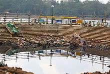 Enclosed section of a lake, with debris along its sides