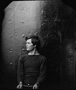 Powell photographed in profile aboard the USS Saugus by Alexander Gardner.