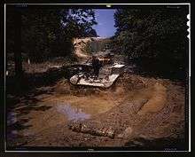 A M3A1 going through water obstacle, Ft. Knox, Ky.