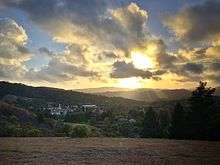 The sun and clouds above Moraga, California in 2014.