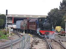 One of the museum's steam engines hauling a special train on the museum site - 3 ft 6 in gauge on right, 18 in gauge on left.