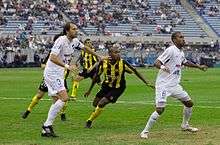 Rolín (right) vs Peñarol