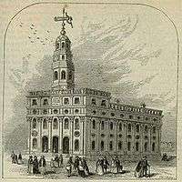 People enter and leave the ornate Nauvoo Temple