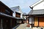 Wooden houses with white walls.