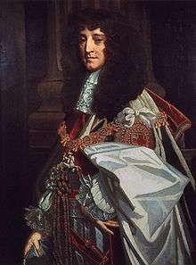 This painting of Prince Rupert shows an older man, posed sideways to the viewer. He is dressed in full state regalia, with gold chains and expensive clothes. His hair is long, black and curled. He looks older, but his facial experience looks slightly sardonic.