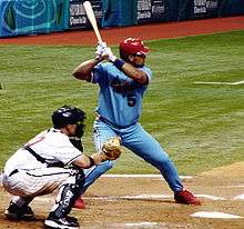 Albert Pujols, wearing the Cardinals' alternate powder-blue uniform, prepares to swing