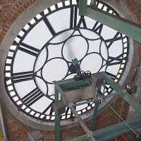 Behind clock face