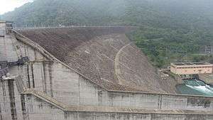 The Randenigala Dam as seen from the southern bank, with the power station in the background.