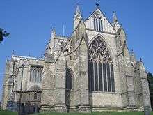  The square east end of Ripon Cathedral is defined by strongly projecting buttresses terminating in gables and pinnacles. There is a large decorated east window with tracery in a circle like the west window at Exeter.