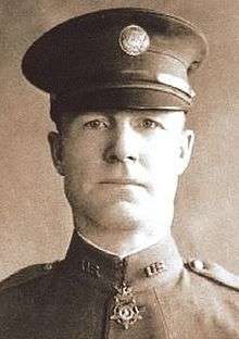 Head and shoulders of a man in military uniform wearing the Medal of Honor.