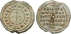 Lead seal with cross surrounded by legend on the obverse and a simple legend in the reverse