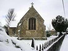 Saint Georges church from the south in January snow