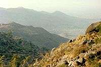 A landscape view of a series of rocky valleys.