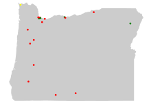 Outline of map of Oregon with colored dots representing the location of Superfund sites in the state