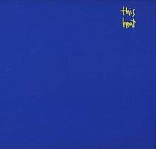 A blue background with the words "This Heat" written in small, yellow handwritten font in the top-right quarter of the image.