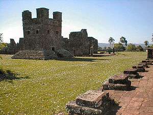 Ruins of stone buildings.