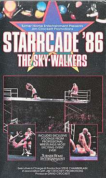 Official VHS cover featuring photos from Starrcade matches