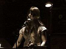 Weyes Blood performing in 2010.